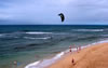 A windsurfer in front of the Maui Kai